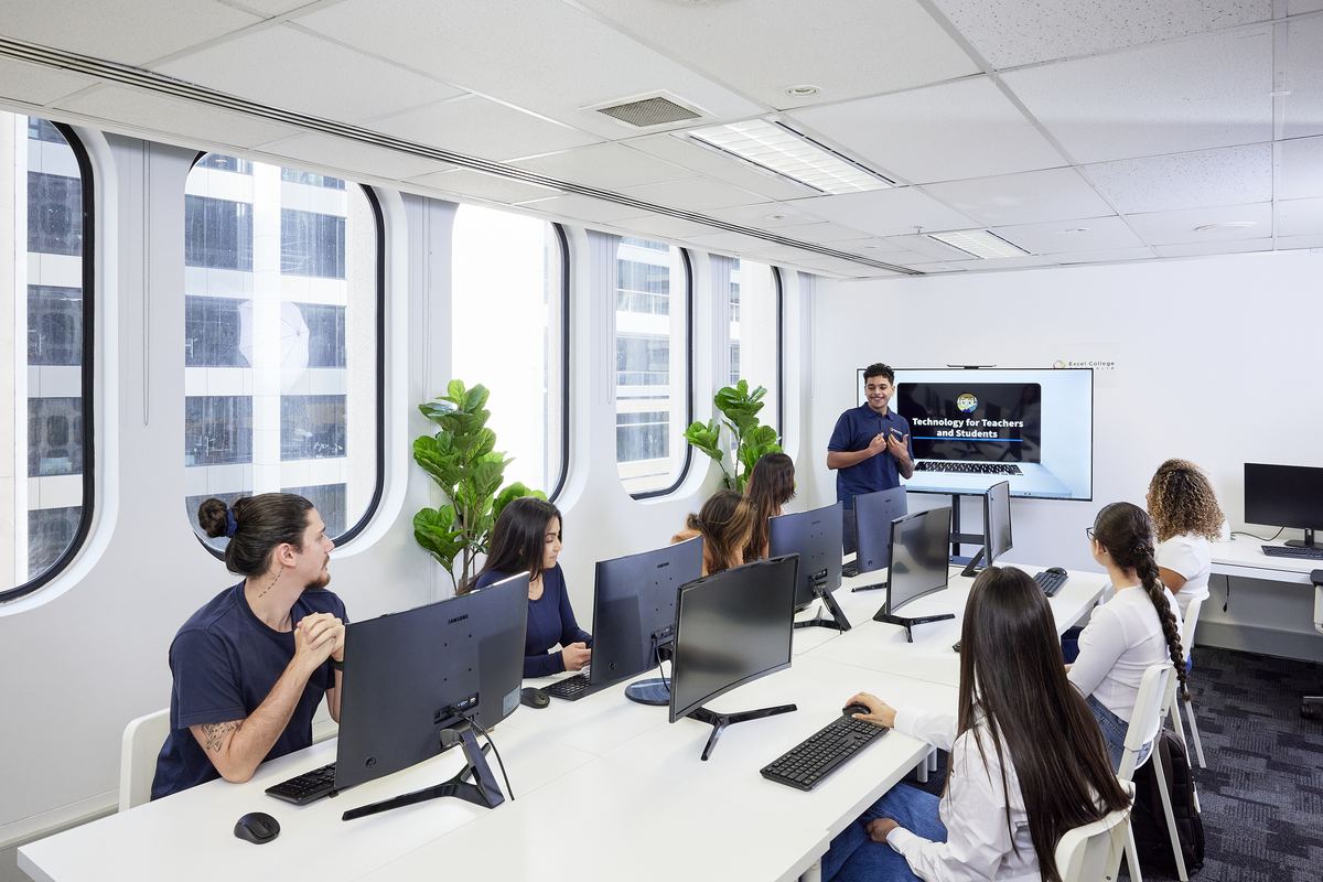 Students in a technology training session for care documentation systems